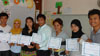 The teachers of Gems International school with their certificates for completing the Reading Roots seminar.